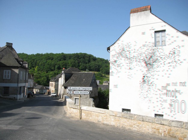 Photomontage : prévisualisation du nuage de mot sur une façade.
